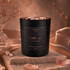 Black candle labeled &