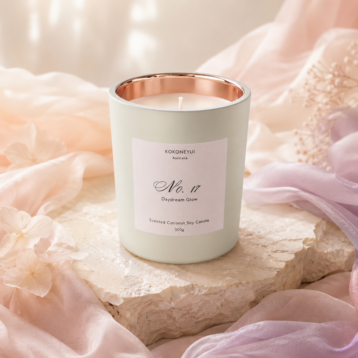 Candle with a white label on a soft, blurred background