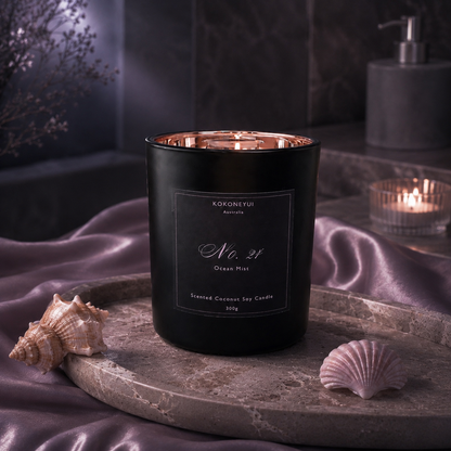 Black candle labeled &