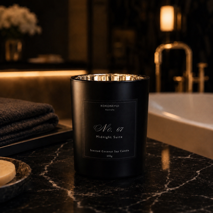 Black candle labeled &
