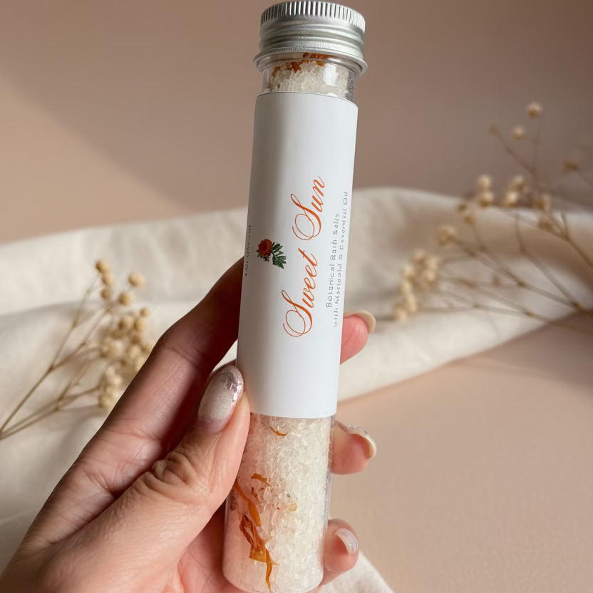 Hand holding a tube of &